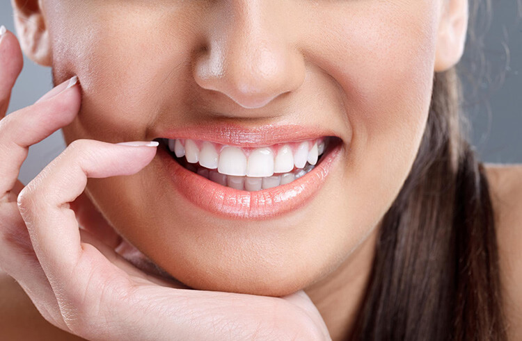 Image highlighting cosmetic dentistry services, like teeth whitening, at Burlington Family Dental.