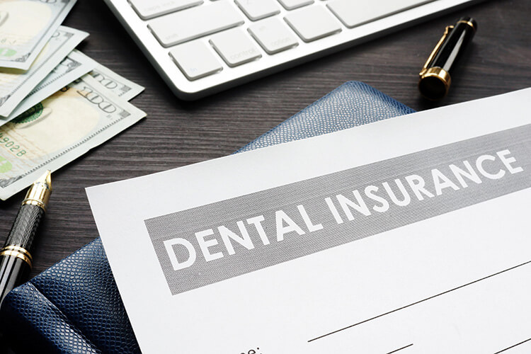 Image symbolizing dental insurance options accepted at Burlington Family Dental.