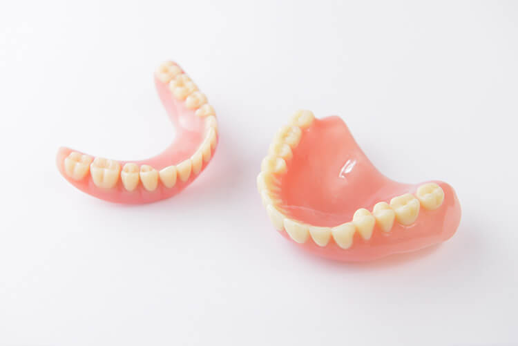 Image representing dentures and partials services at Burlington Family Dental for tooth replacement.